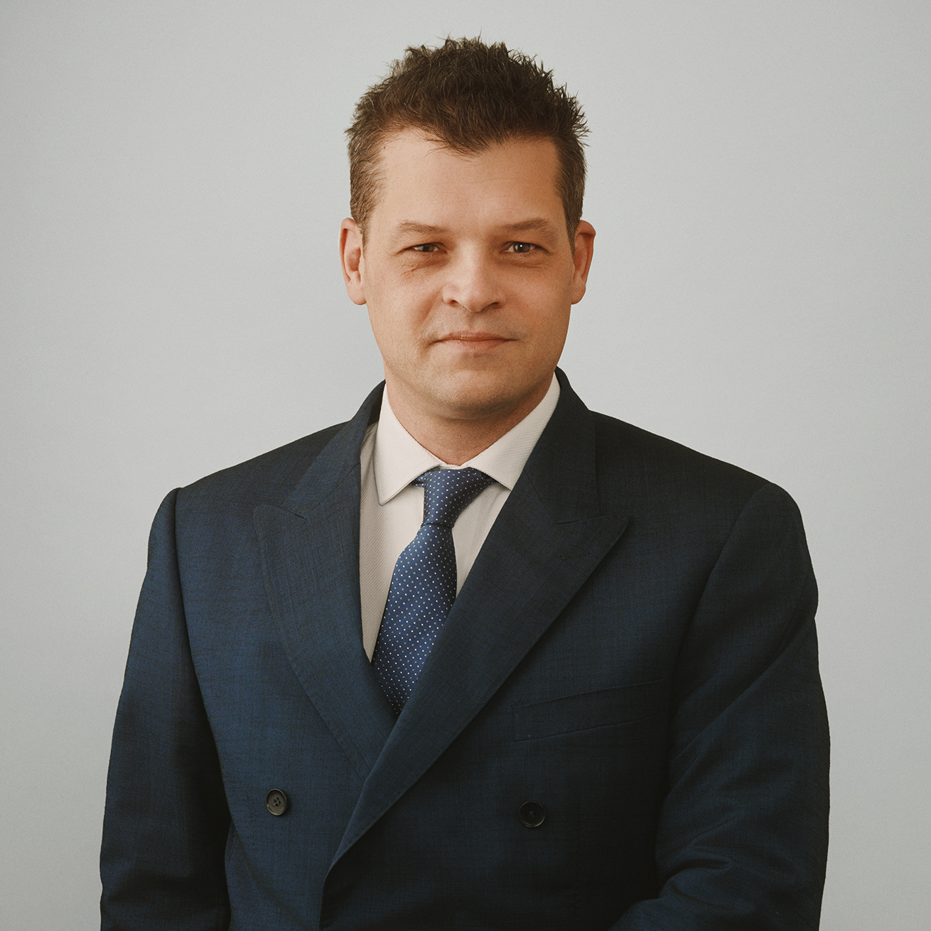 Photo de Damien Tournaire, avocat spécialisé en droit immobilier et en droit des affaires à Genève